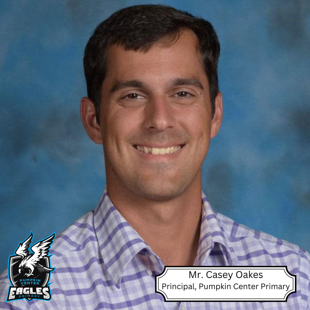 A man in a purple and white checkered shirt smiles at the camera. Text reads Mr. Casey Oakes, Principal, Pumpkin Center Primary.