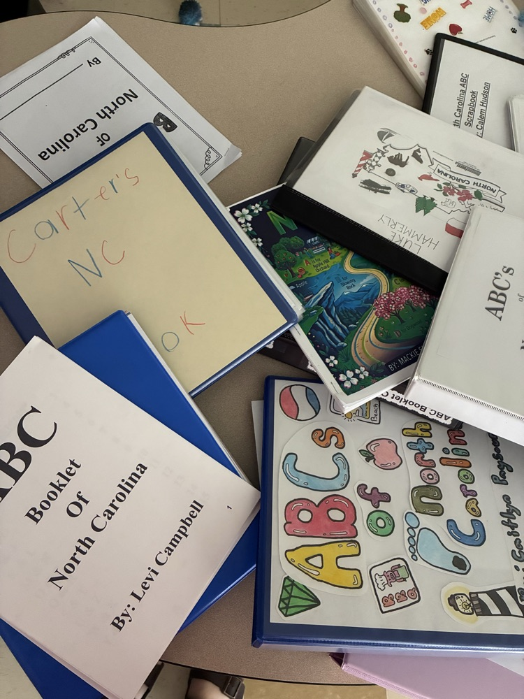 Mrs. Reeder’s class’ NC scrapbooks in a pile (part 1)