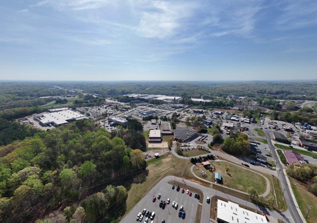 Example of photo taken by students enrolled in Drone Technology I.  A view from above of LCST and the surrounding area.