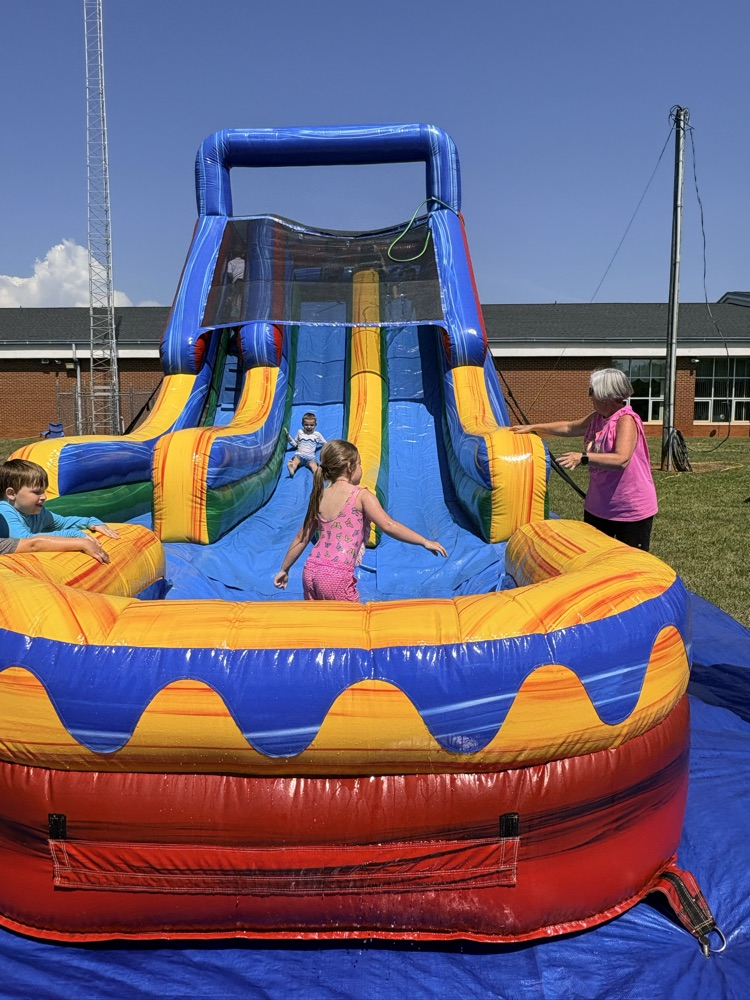 water slide with kids sliding down