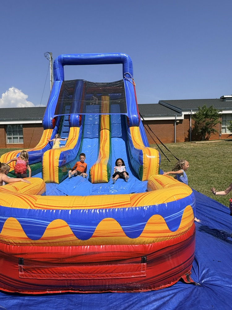 water slide with kid sliding down