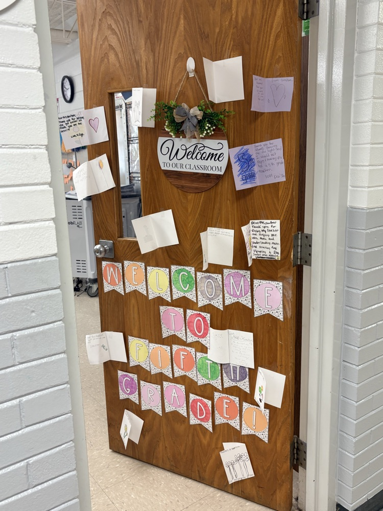 cards on a wooden door