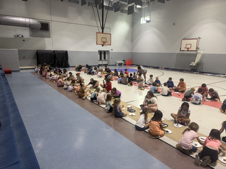 students painting rocks