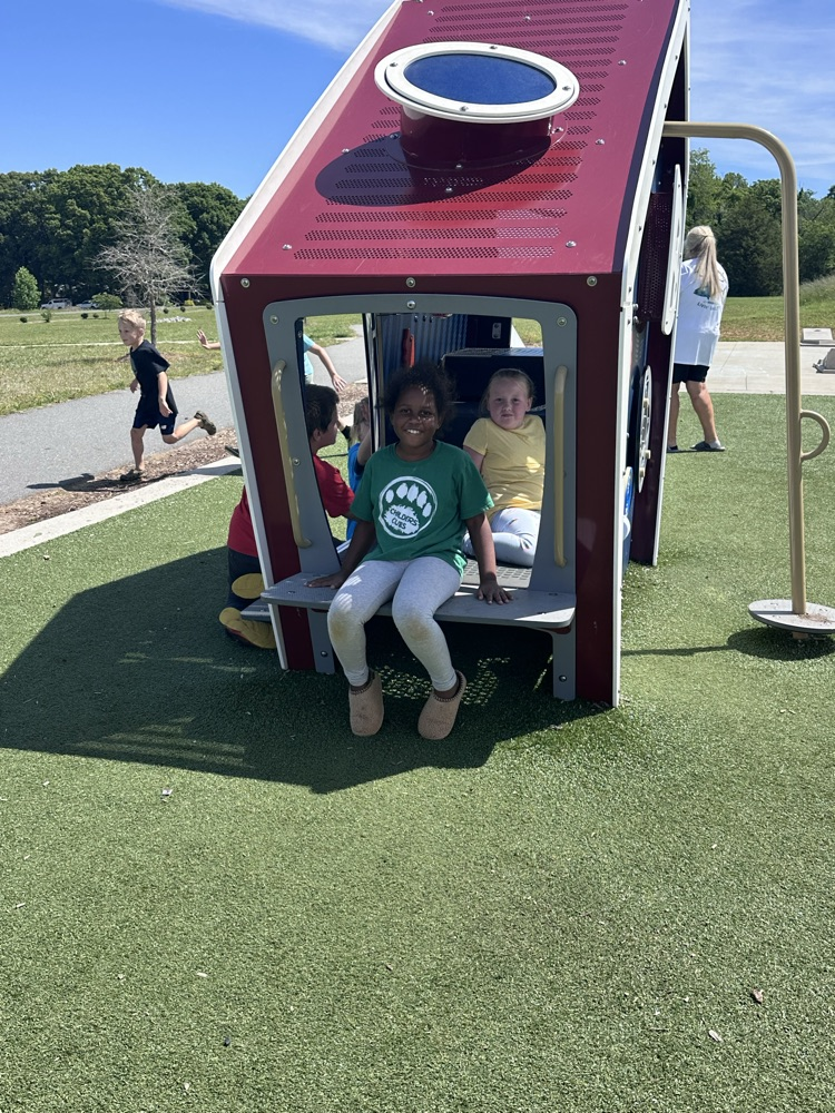 second grade girls playing on playground