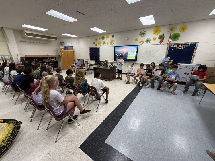 Fourth grade students present a mock courtroom trial.