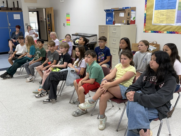 Fourth grade students present a mock courtroom trial.