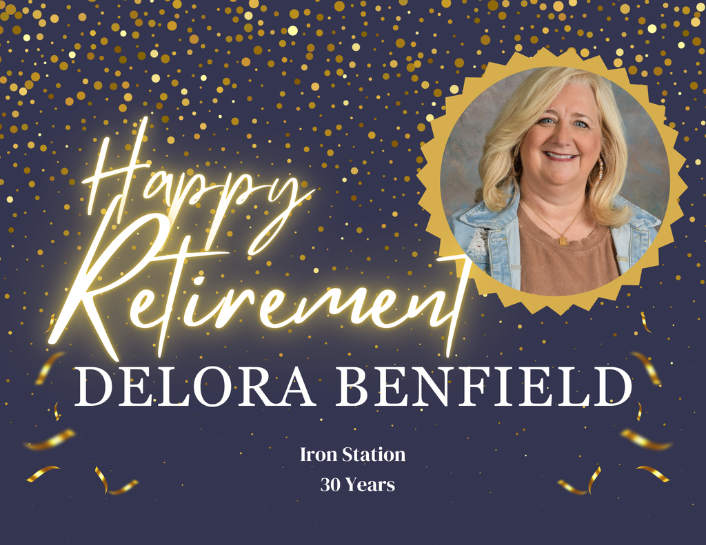 A retirement celebration flyer with a dark blue background decorated with a gradient of sparkling gold confetti at the top and floating gold ribbons at the bottom. On the right side, a circular portrait with a gold serrated border shows a smiling woman, Delora Benfield, with blonde hair, a light blue denim jacket, a brown t-shirt, large hoop earrings, and a gold necklace. The text on the flyer reads: "Happy Retirement DELORA BENFIELD Iron Station 30 Years".
