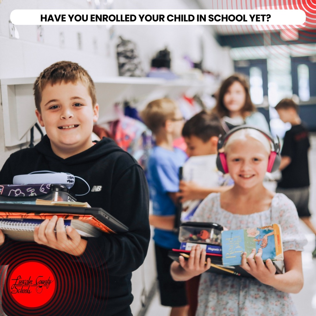 Children in a school corridor. A boy holds books and a record, while a girl holds books and wears headphones.