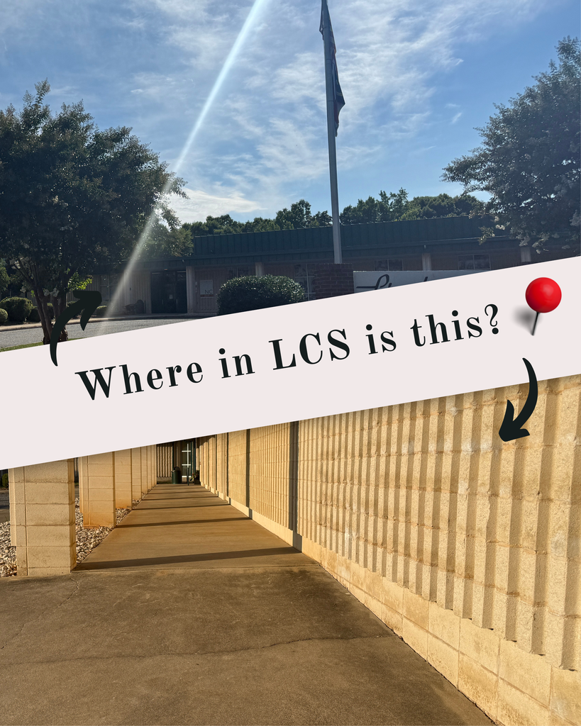 A building with a flag, a sunbeam, a tree, and a path. Text reads "Where in LCS is this?" with a red pin.