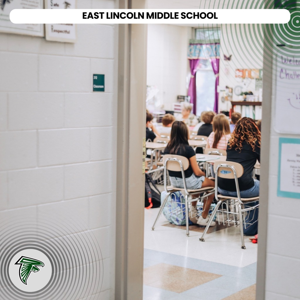 An open door showing students sitting at desks in a classroom at East Lincoln Middle School.