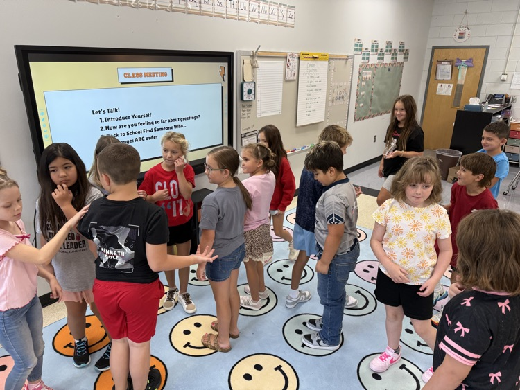Students in Mrs. Watson’s class arrange themselves in alphabetical order without speaking