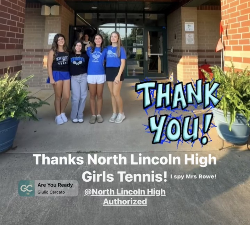 Five women in matching blue shirts stand outside a building. A large text "THANK YOU!" is displayed.