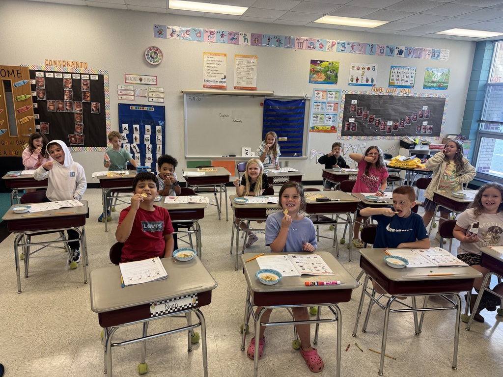 Students enjoying a snack after problem-solving word problems.