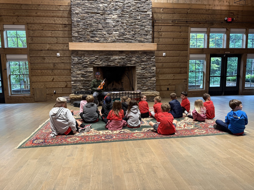 Students learning about music on their field trip to Hart Square