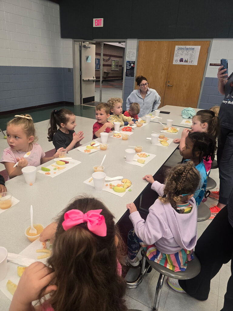 Pre-K students participating in Johnny Appleseed Day