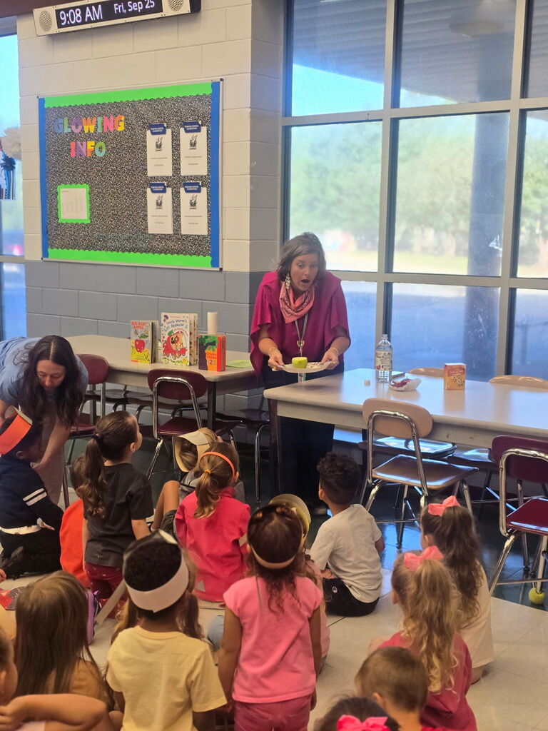 Pre-K students participating in Johnny Appleseed Day