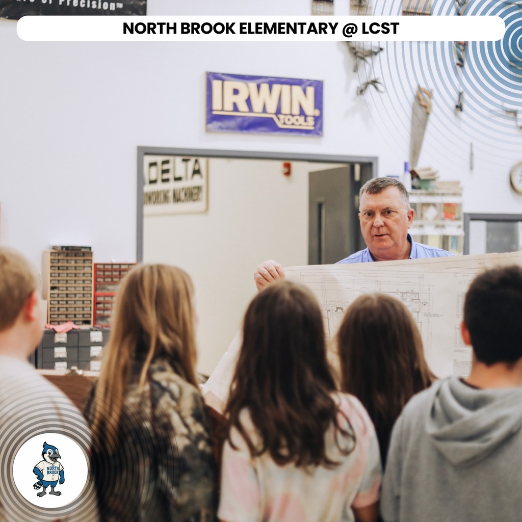 A group of children looks at a large paper held by an adult. The text reads "Irwin Tools".