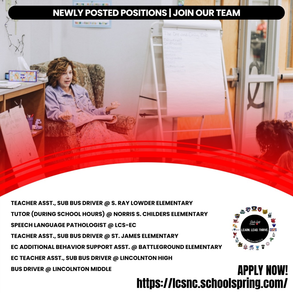 A woman sits in a chair reading while a sign lists various job openings, including positions like teacher assistant, sub bus driver, and speech language pathologist.