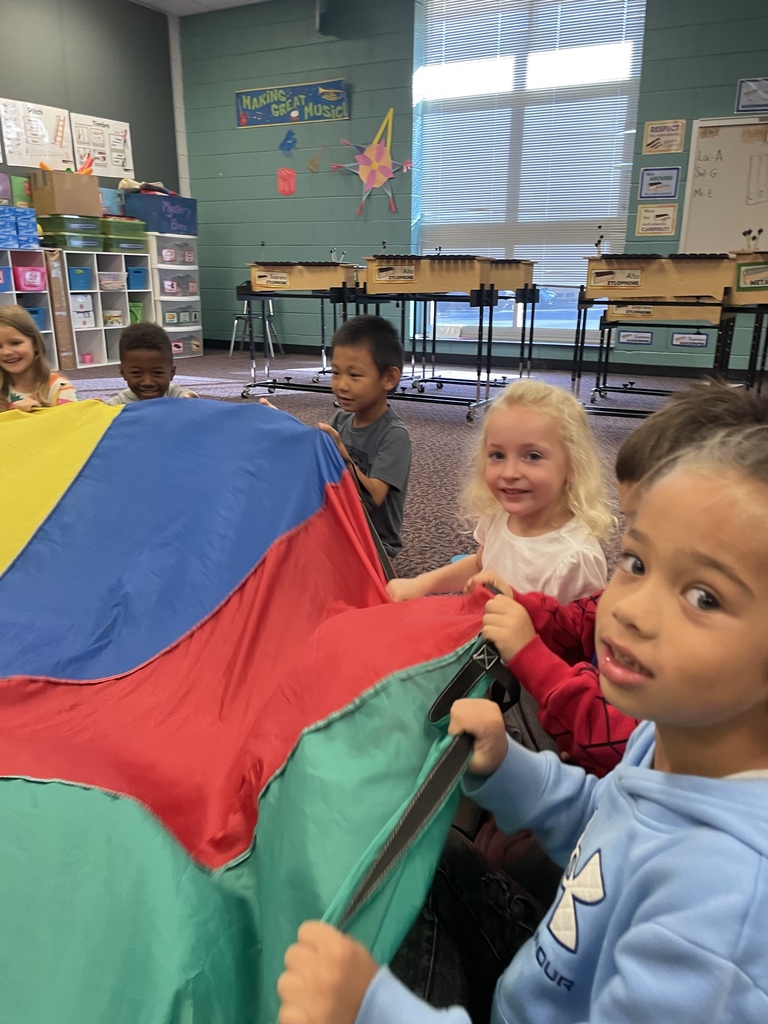 Students learning form of music through movement