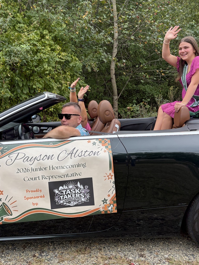People in a convertible car with a banner reading "Payson Alston, 2020 Junior Homecoming Court Representative" against a background of trees.
