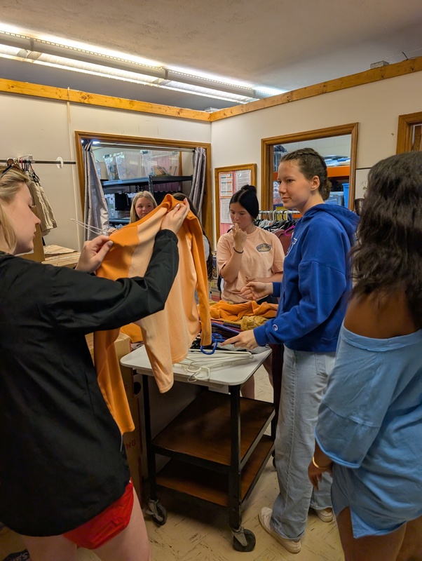 SGA members stocking items at the ARC.