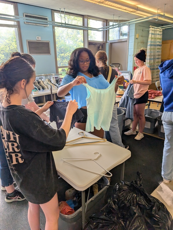 SGA members stocking items at the ARC.