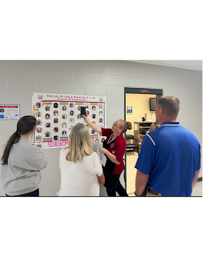 Teachers looking at wall