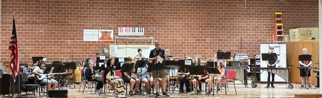 Whole band playing instruments