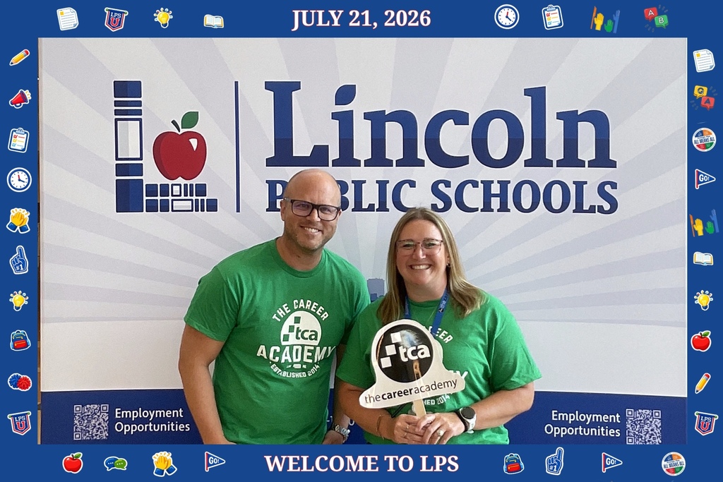 Mr. Jones and Mrs. Crabtree holding TCA sign. 