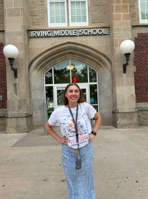Mrs. Sysomphone standing outside Irving Middle School on the first day of school.
