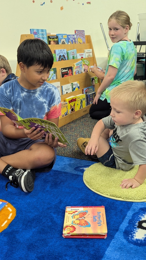 The Little Leopard Learners love their 5th grade reading buddies! 