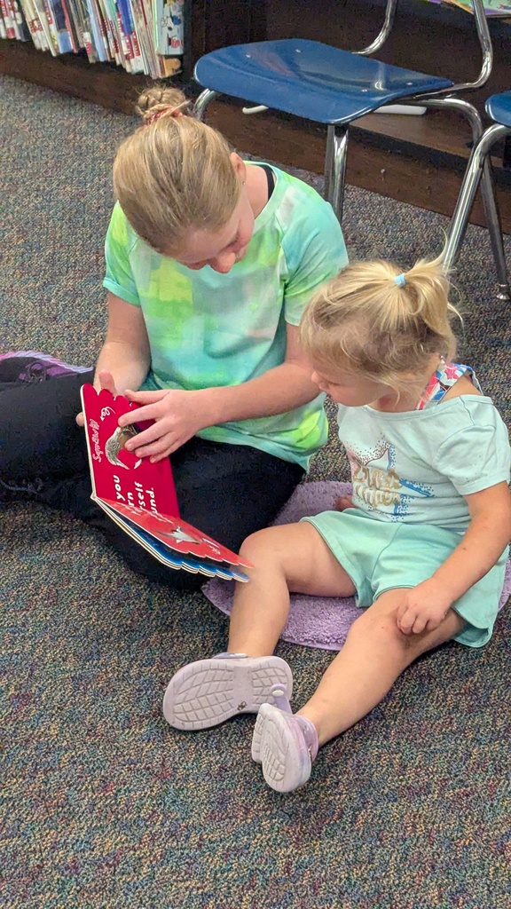 The Little Leopard Learners love their 5th grade reading buddies! 