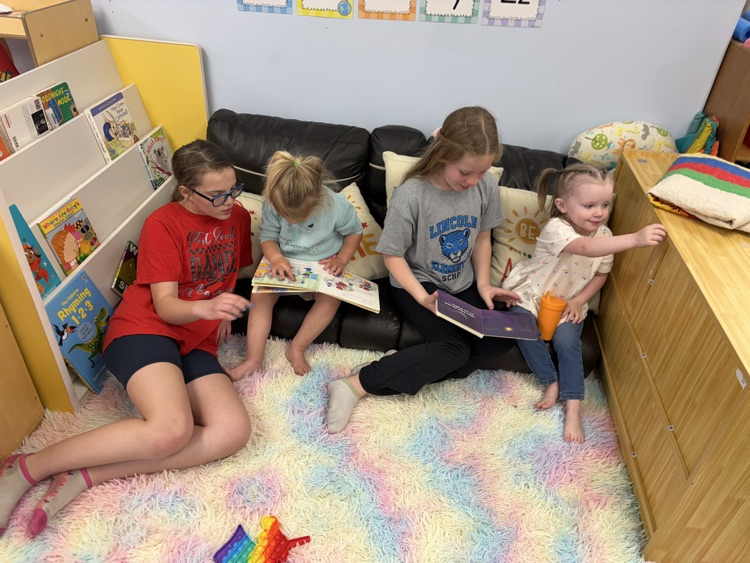 Little Leopard Learners had fifth grade reading buddies come today