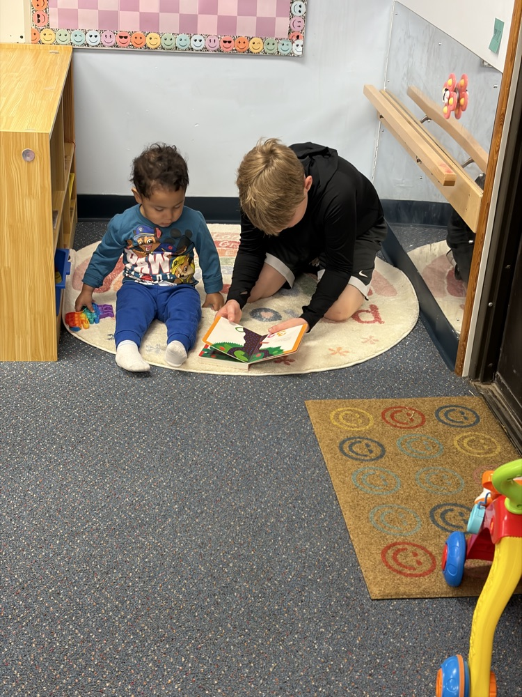 Little Leopard Learners had fifth grade reading buddies come today