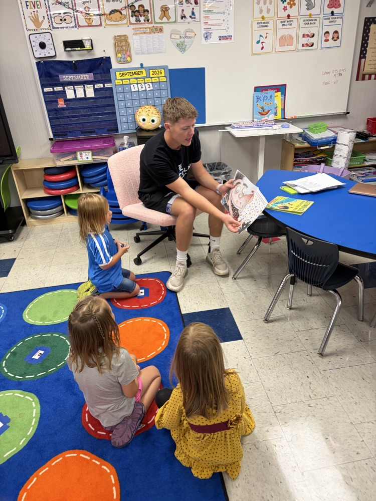football seniors came to read with preschool