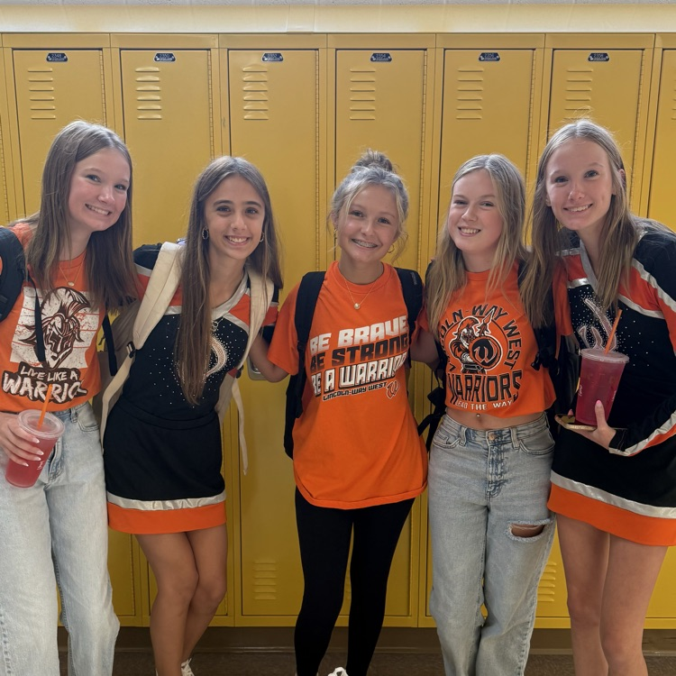 students wearing orange 