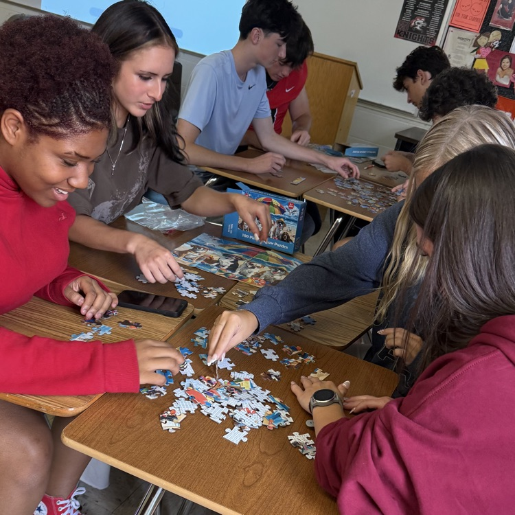students doing a puzzle
