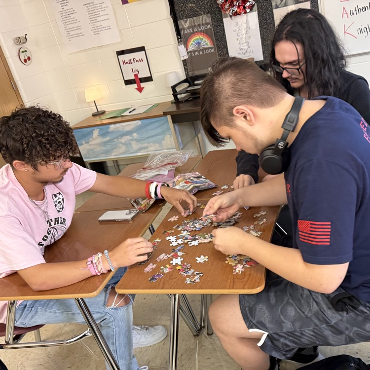 students doing a puzzle