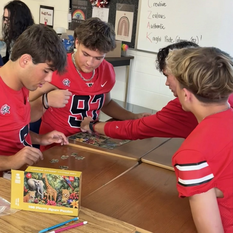 students doing a puzzle