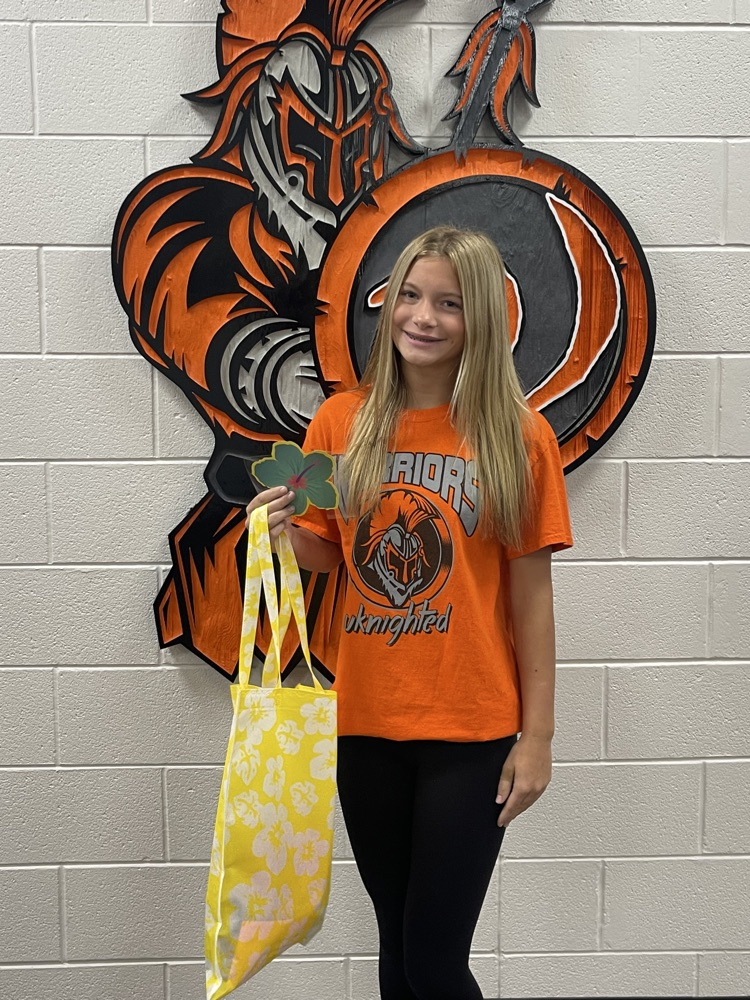 student with tropical bag