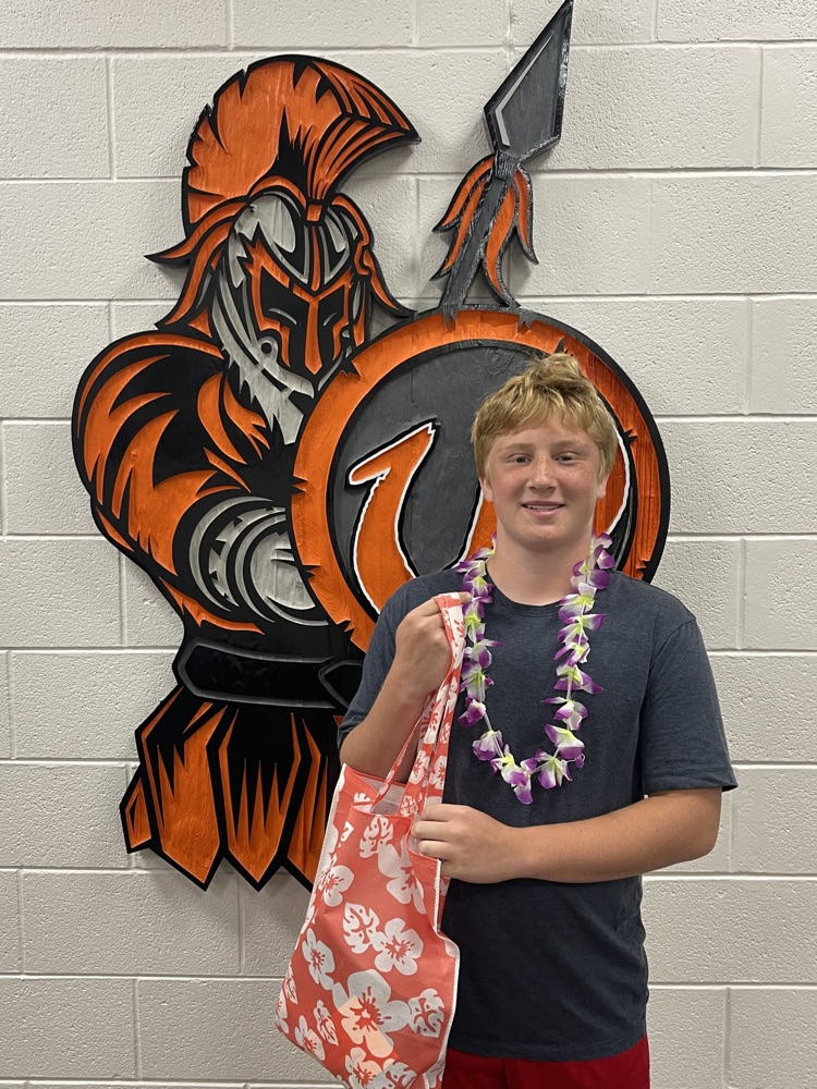 student with tropical bag