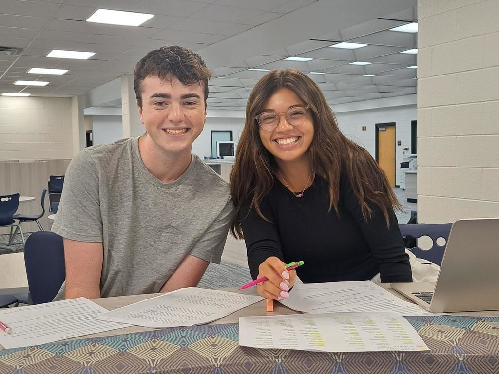 Spanish 5 students using library