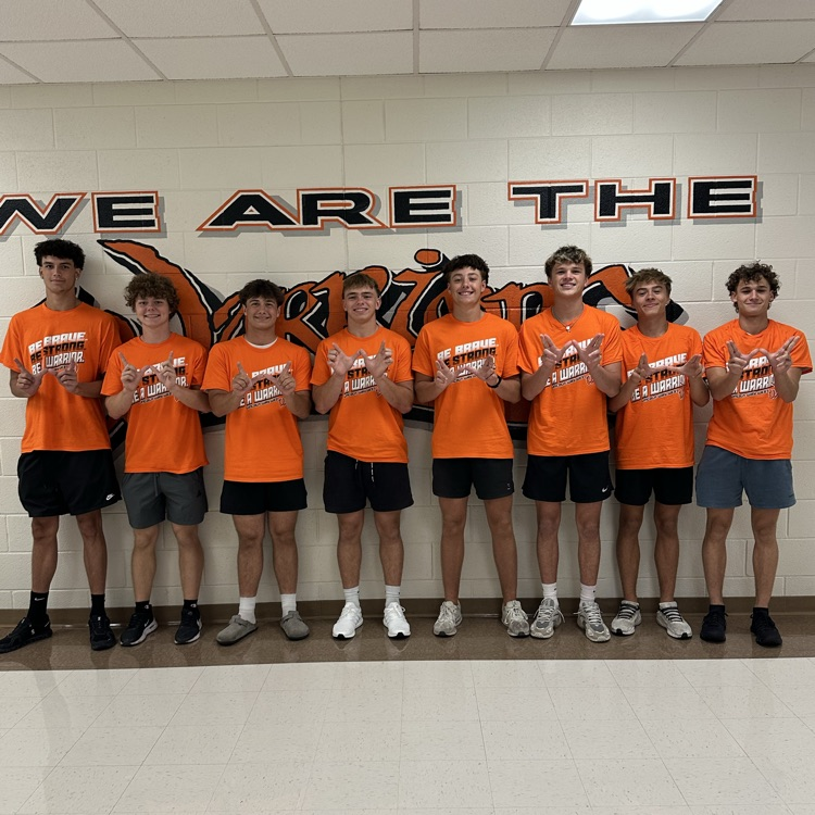 students wearing orange 