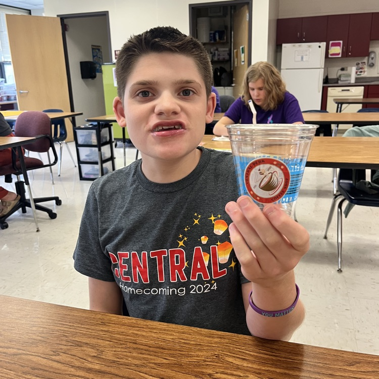 students working on cups