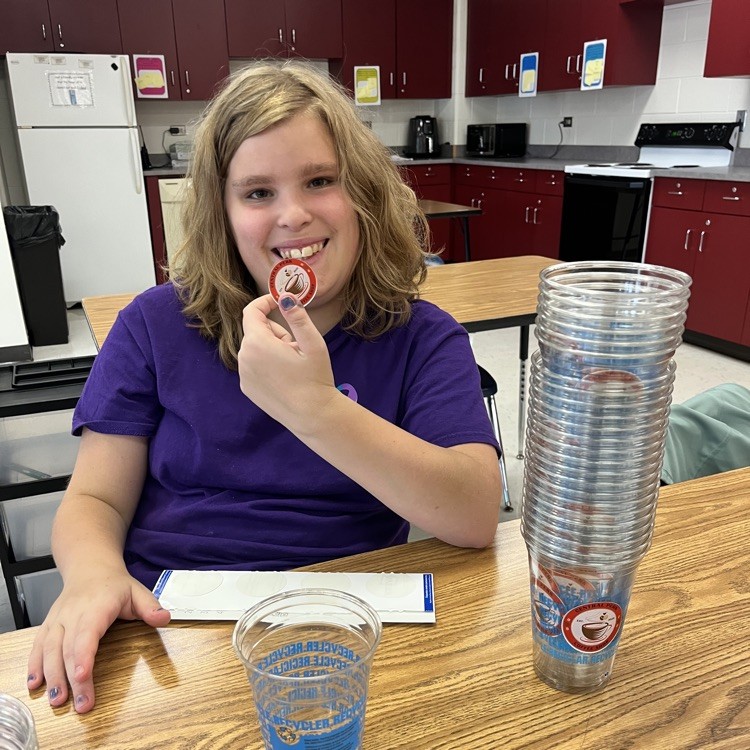 students working on cups