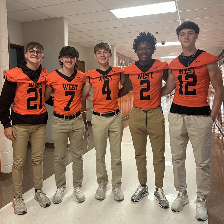 students wearing orange