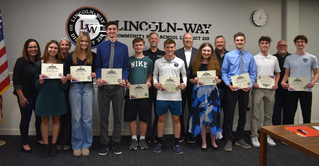 Perfect ACT score students with the board