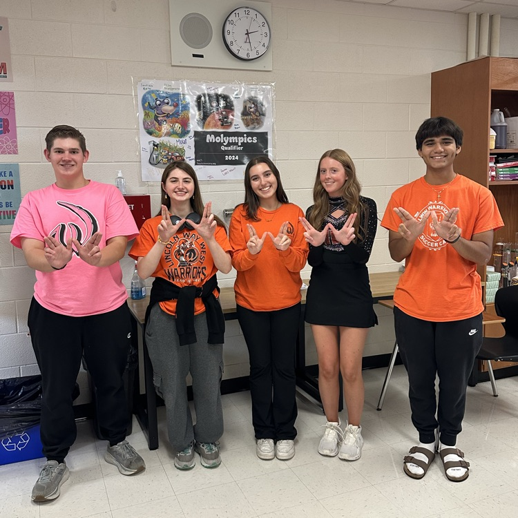 students wearing orange
