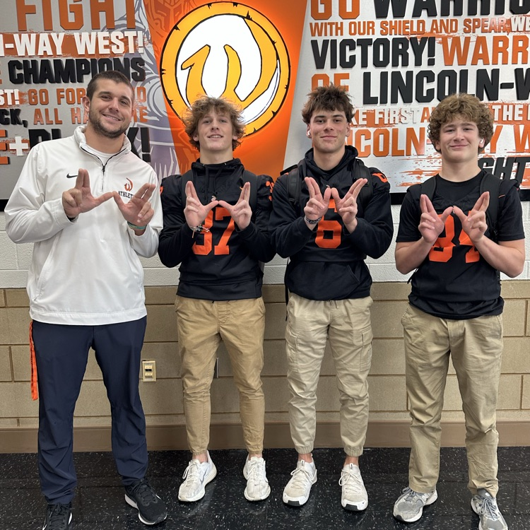 students wearing orange 