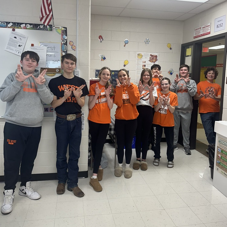 students wearing orange 